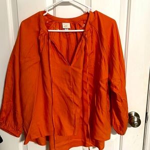 A New Day size small high low top NWOT.